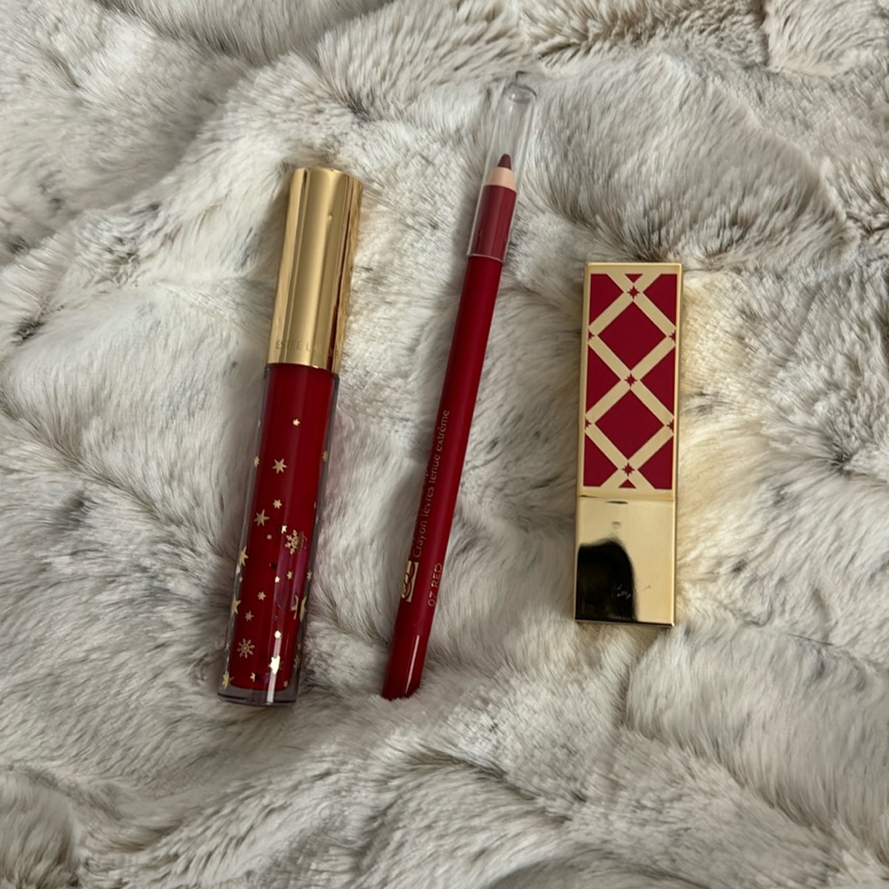 Estée Lauder lipgloss, pencil and lipstick. Brand new